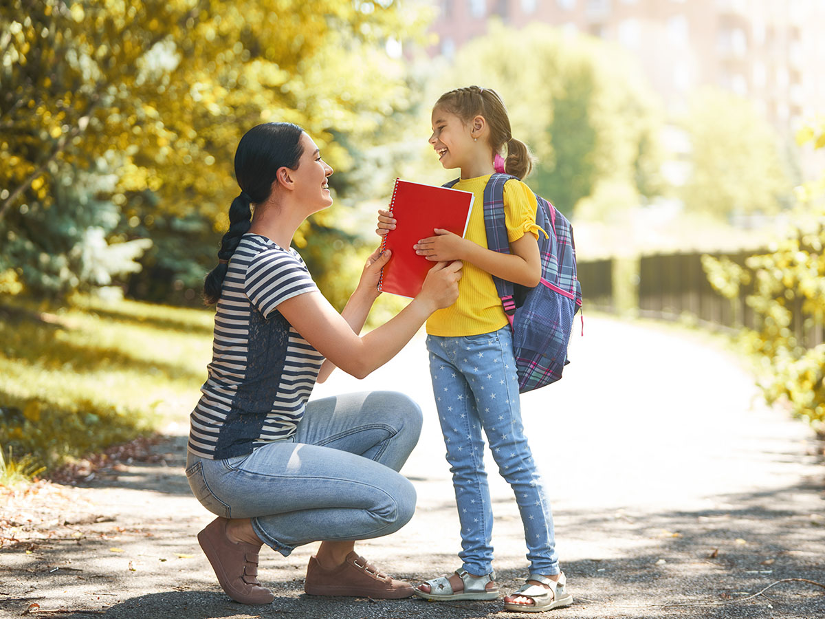 A parent speaking a foreign language with their child